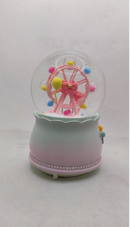 گوی کریستالی پمپاژی موزیکال طرح چرخ و فلک با قابلیت تغییر آهنگ و نور و چرخش چرخ و فلک