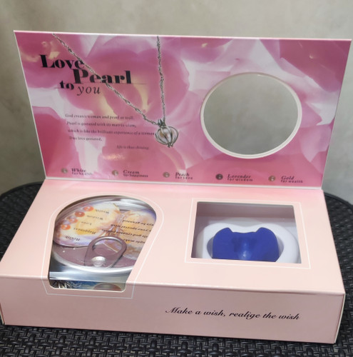 جعبه صدف و مروارید و گردنبند عشق